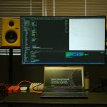 a laptop computer sitting on top of a desk frontend debugging dashboard, session replay interface, error tracking panel
