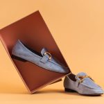 a pair of shoes sitting inside of a box product photography, background removal, ecommerce images