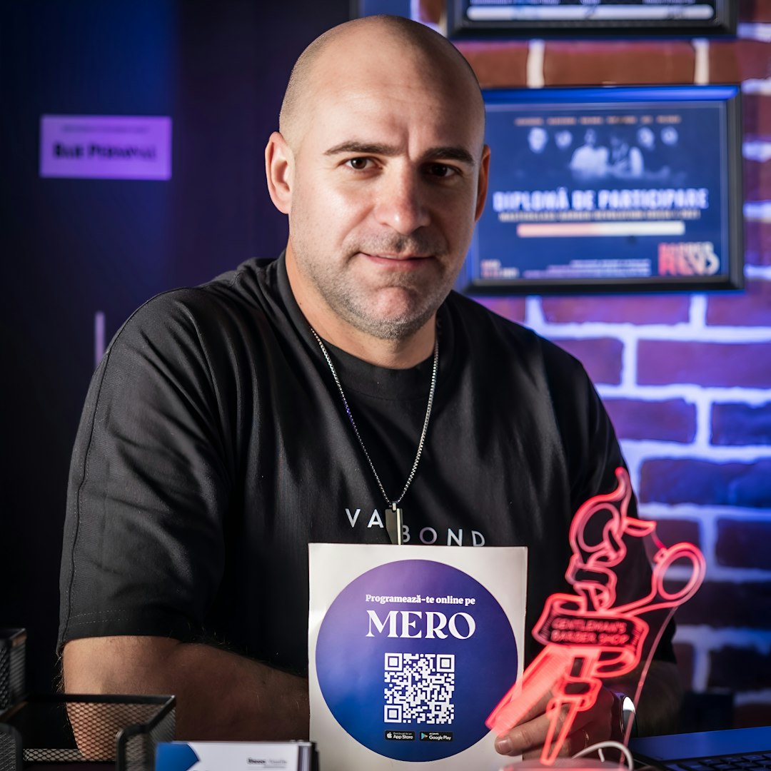 Bald man holding a trophy and a certificate scorecard, founder roles, ecommerce strategy