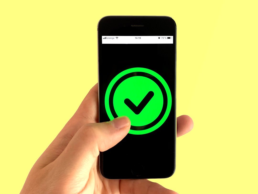 black android smartphone displaying green and black logo secure mobile login, biometric authentication, financial app security, encrypted transaction