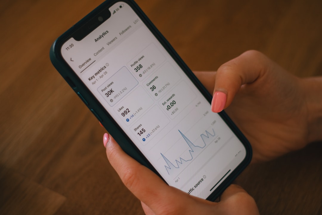 Checking data analytics on a phone. phone messaging app conversation analytics dashboard