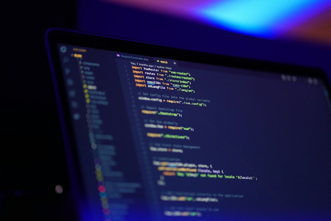 laptop screen displaying colorful code typescript javascript code editor