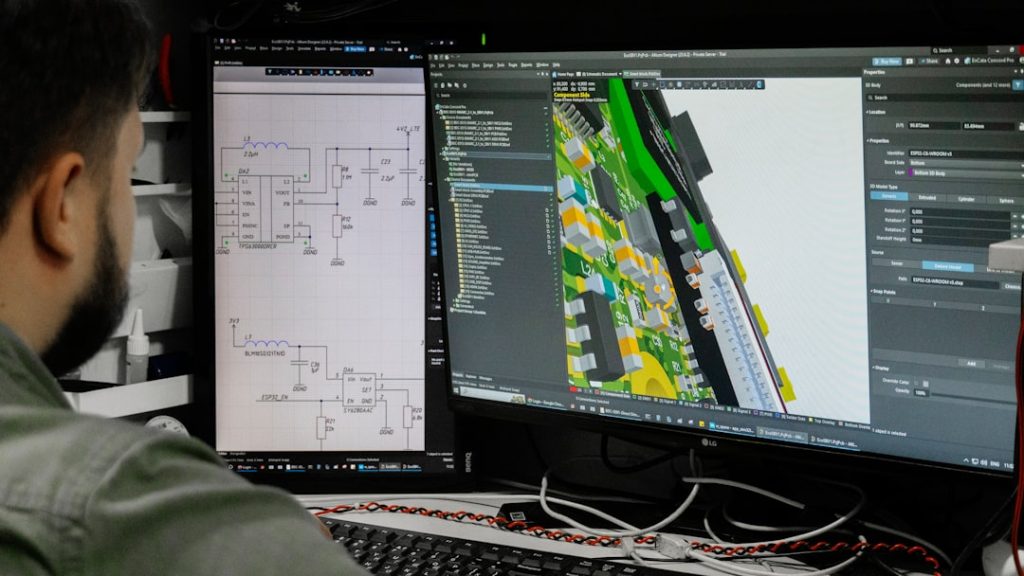 Man looking at circuit board design on computer screen. architect using 3D modeling software, house design model, digital blueprint on screen