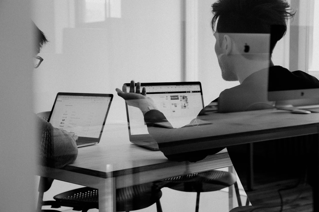 man using MacBook user research, website testing, usability session