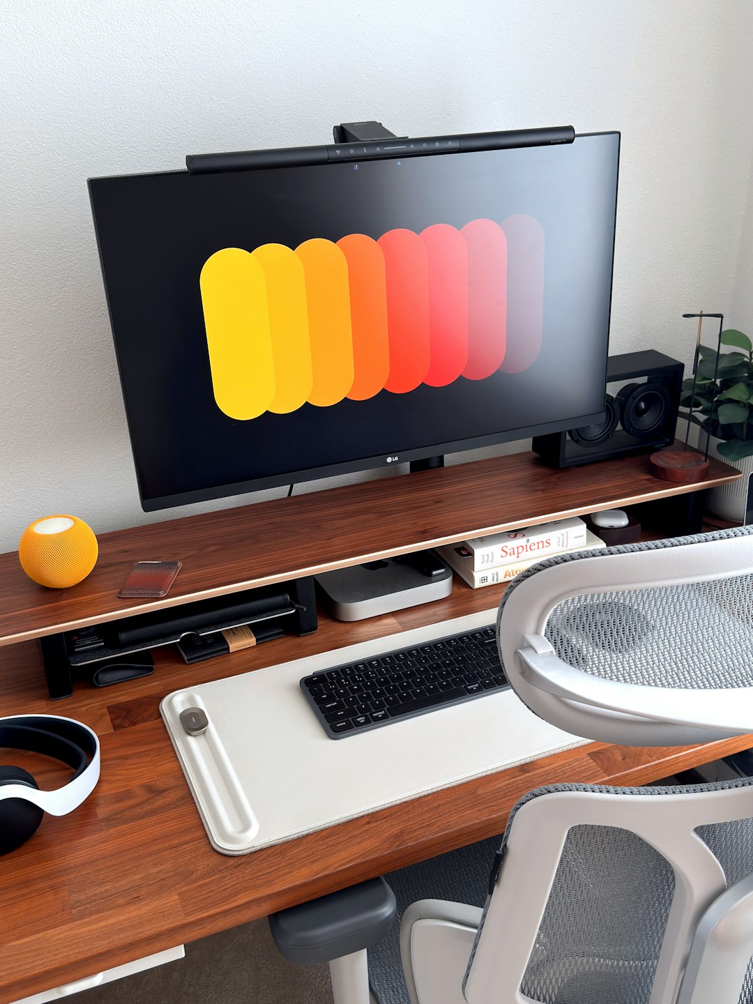Modern desk setup with computer monitor and accessories. organized digital dashboard, legal case timeline screen, productivity workspace