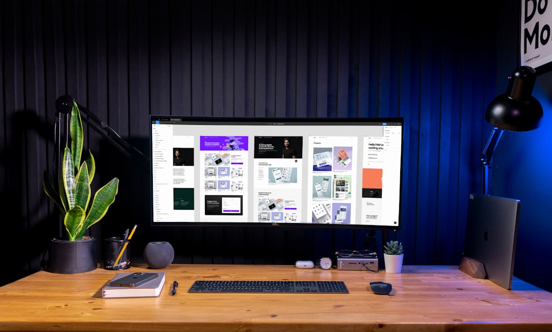 silver imac on brown wooden table designer workspace, image editing, transparent background