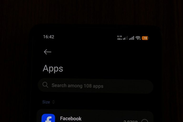 Smartphone screen showing app list with search bar android messages, pdf attachment, rcs settings