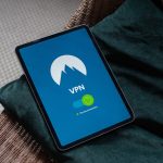 turned-on tablet computer screen vpn app interface, proxy settings screen, website error message, laptop browsing internet