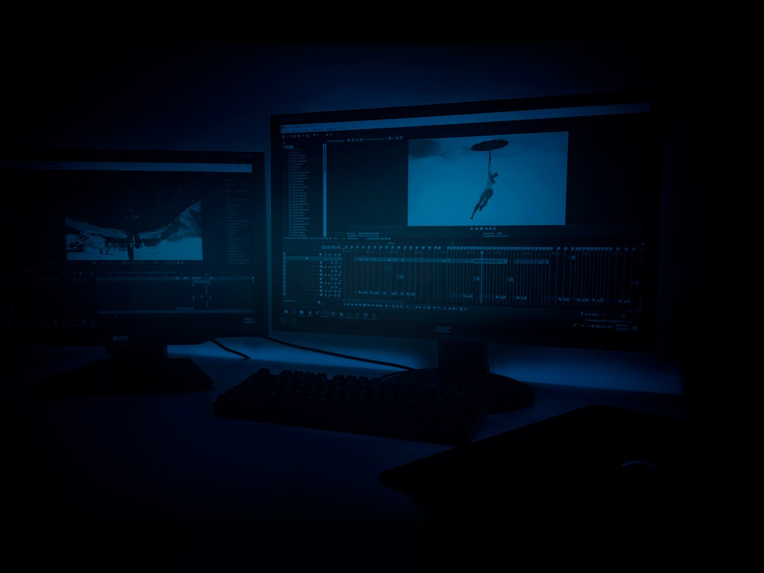 two turned on flat screen monitors digital forensics workstation, cybersecurity analyst, multiple monitors, data analysis
