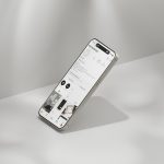 a cell phone sitting on top of a table online store, product listings, clean white background