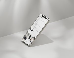 a cell phone sitting on top of a table online store, product listings, clean white background
