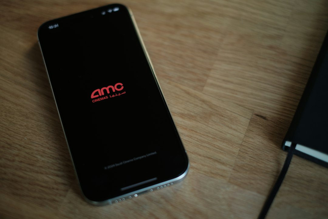 A cell phone sitting on top of a wooden table esim transfer, phone setup, number port