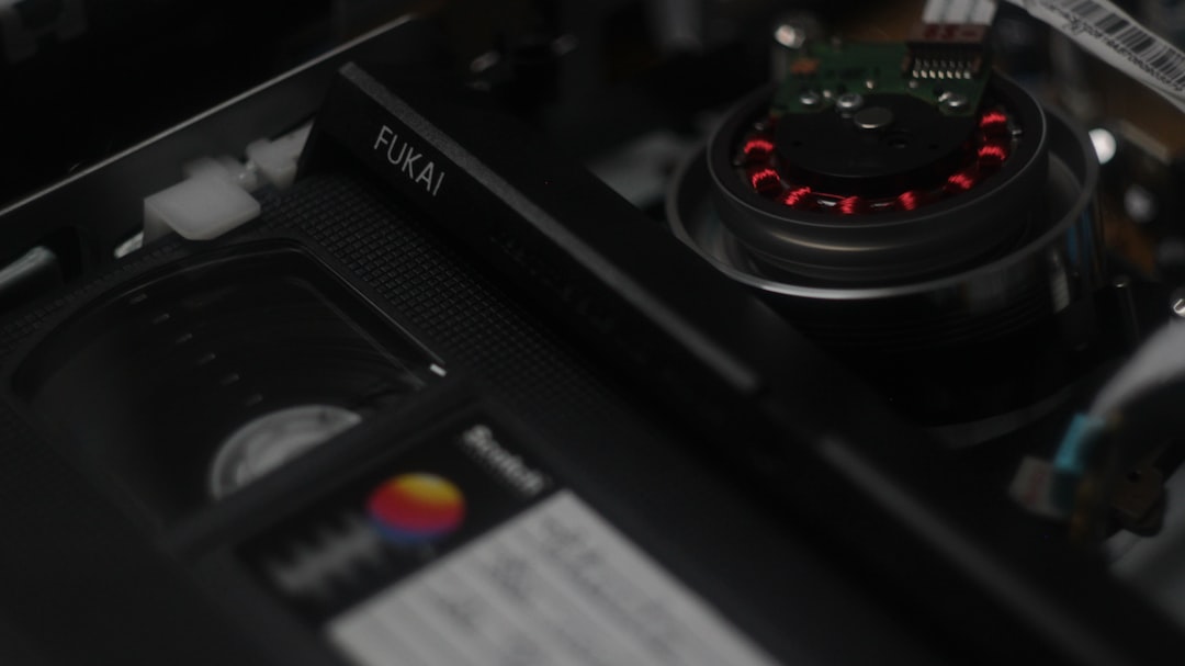 a close up of a computer with a red light on it 4k video timeline editing, export settings screen, storage drive space indicator