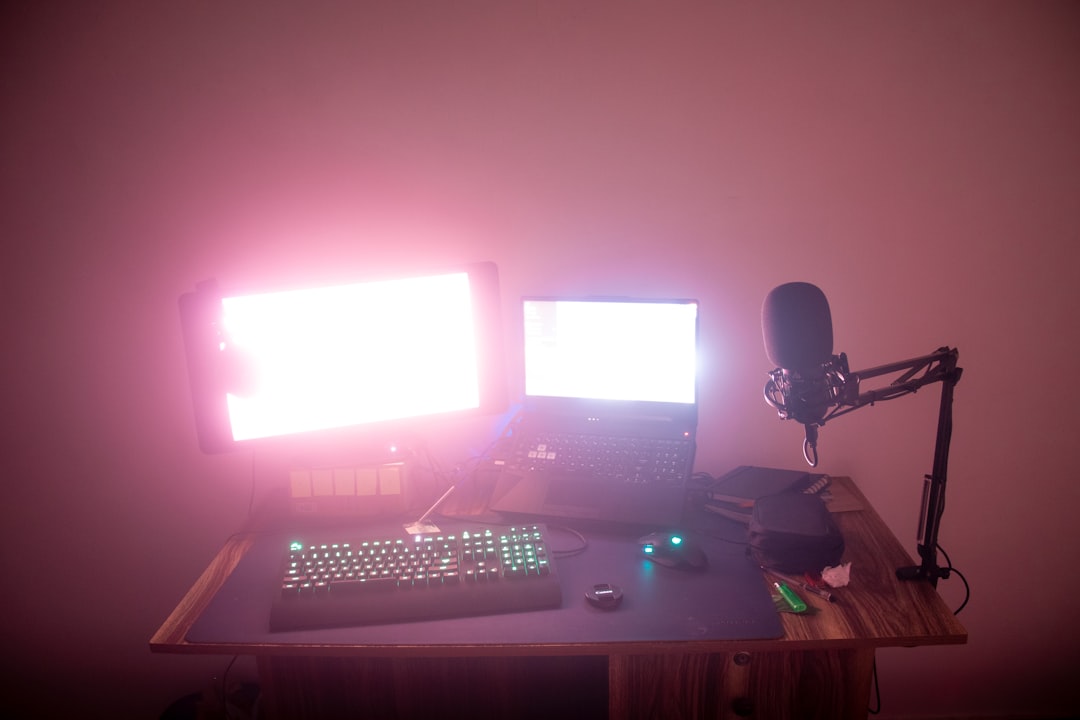 a desk with a computer and a microphone on it professional streaming studio, camera microphone lighting, control desk, live broadcast environment