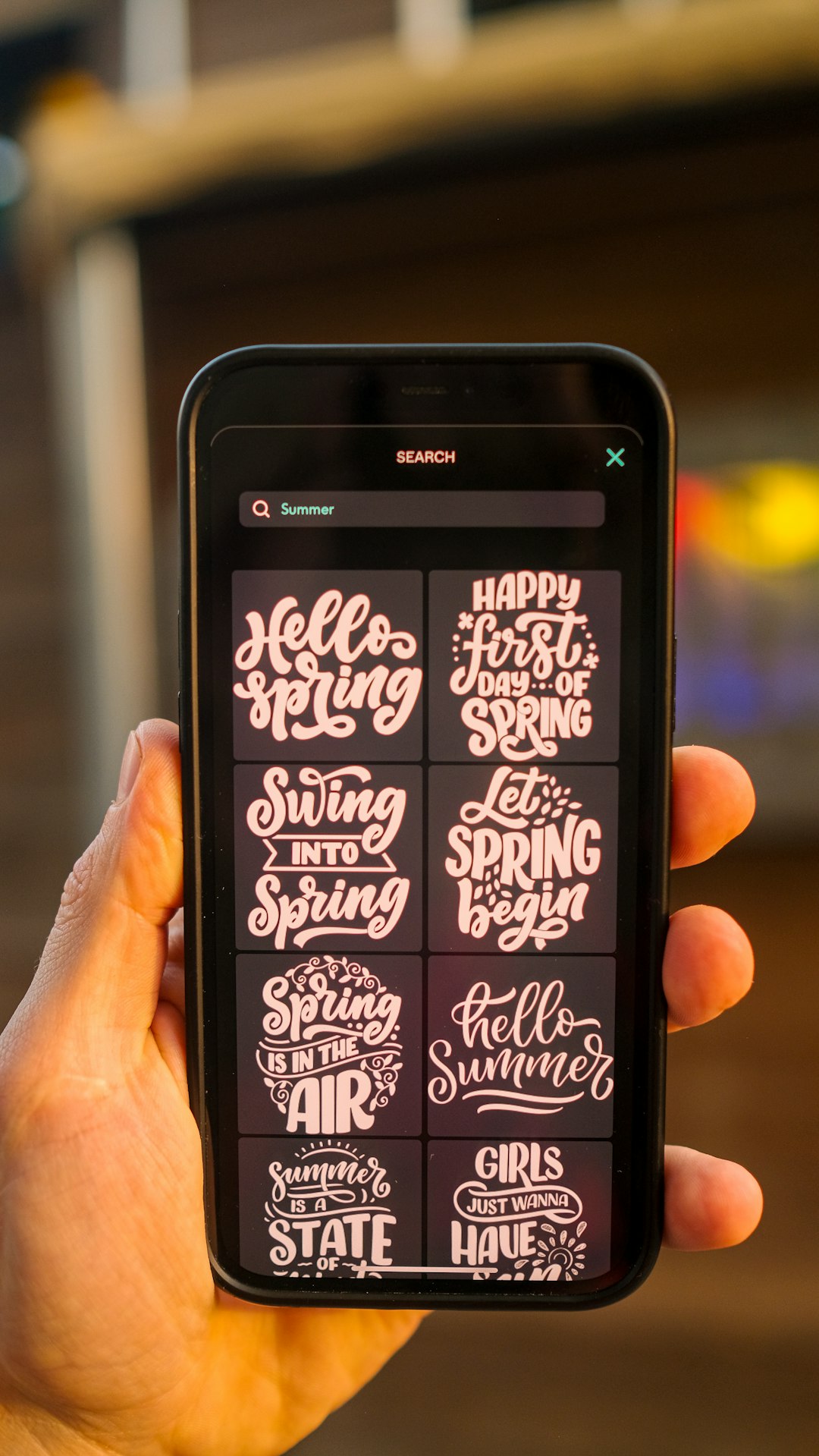 a person holding a cell phone colorful captions, instagram stories, text styles, mobile editing