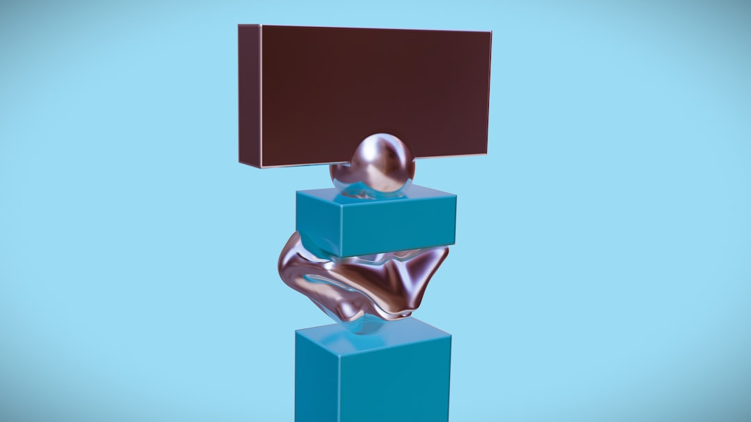 a sculpture of a person sitting on top of a box mid century design, geometric letters, television logo