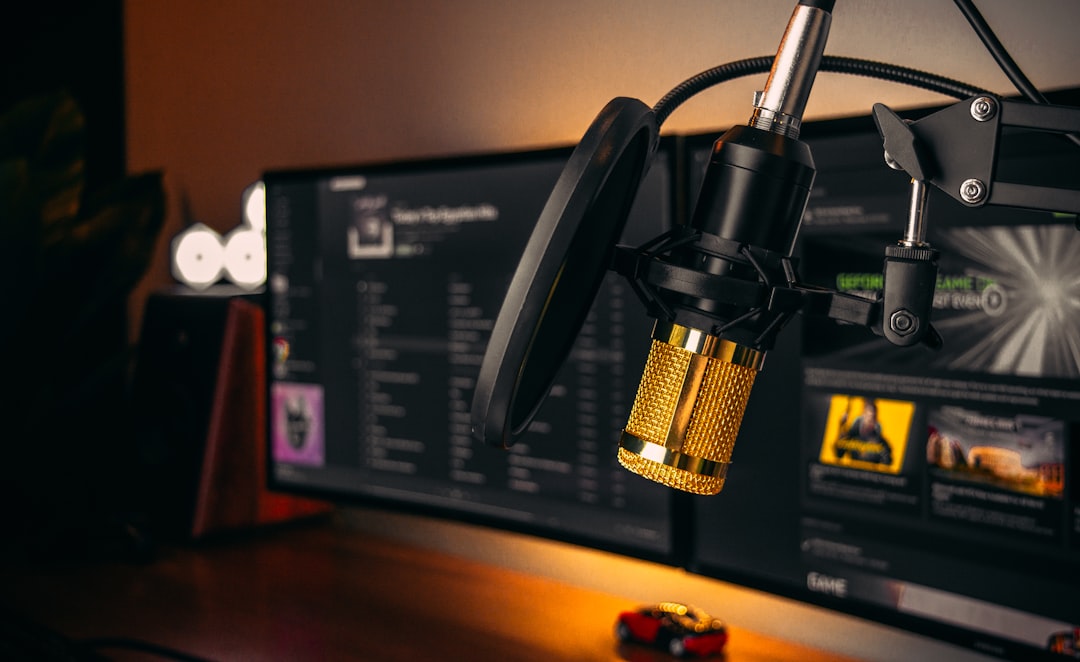 black and yellow box on brown wooden table podcast monetization coins microphone earnings concept