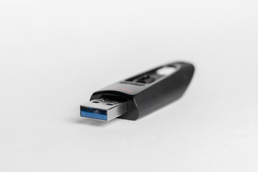 black thumb drive usb drive, anonymous operating system, cyber security