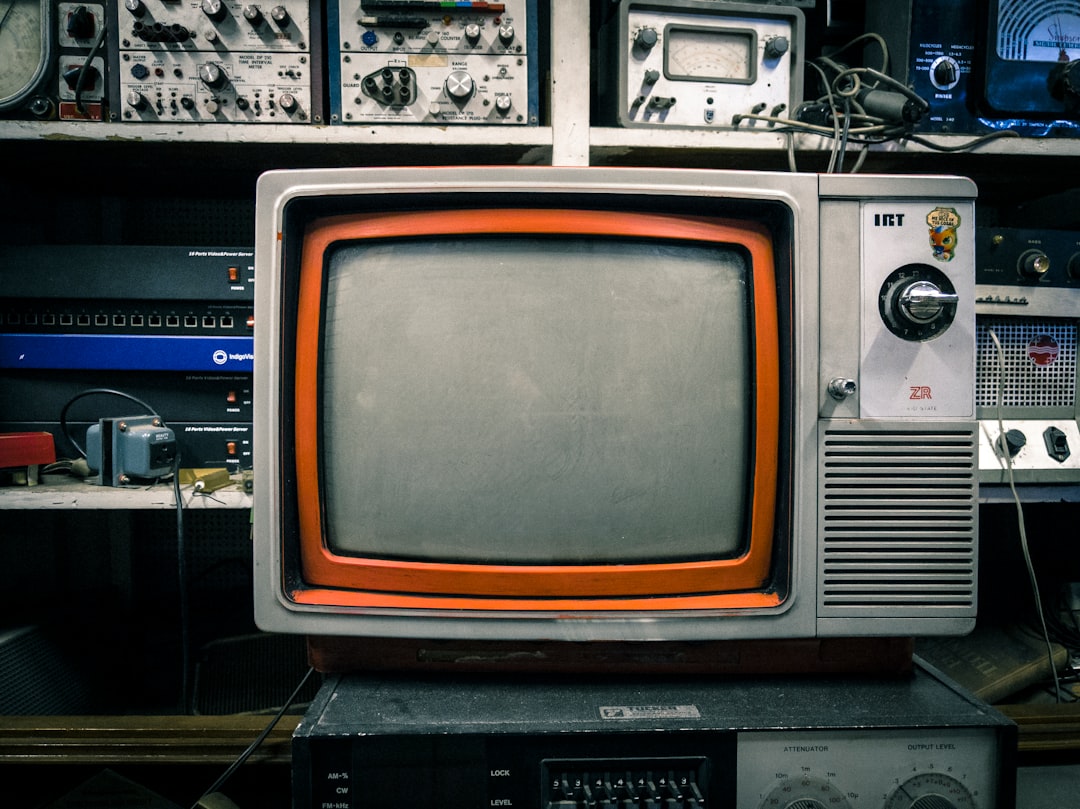 grey and orange CRT TV public television history, old broadcast studio, education media