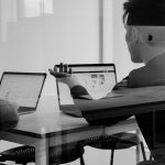 man using MacBook figma interface, beginner workspace, design canvas
