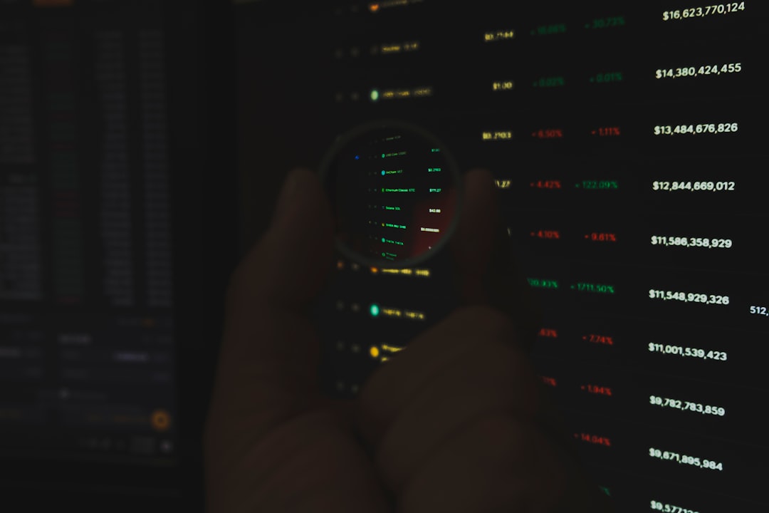 person holding black remote control fraud detection alert screen, suspicious transaction warning, cybersecurity finance concept