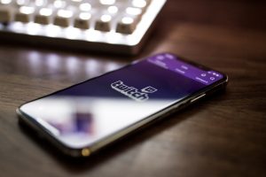 space gray iPhone X smartphone turned on twitch error screen, video player, browser issue