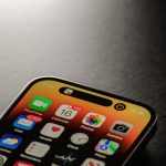 a black cell phone iphone 16 plus, large display, performance testing