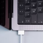 a black keyboard with a white background macbook thunderbolt cable screen sharing