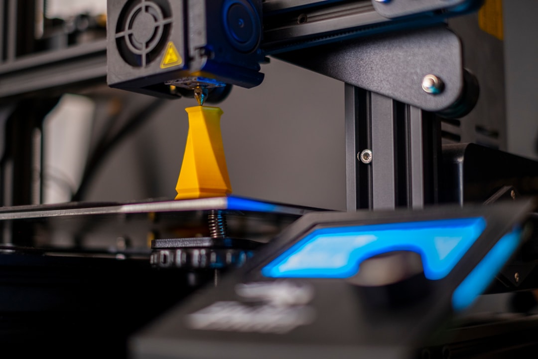 a close up of a machine with a blue light on it finished 3d printed parts, quality inspection, precision tools