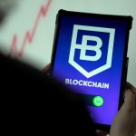 a person holding a cell phone with a blockchain logo on it financial compliance, risk management, blockchain regulation