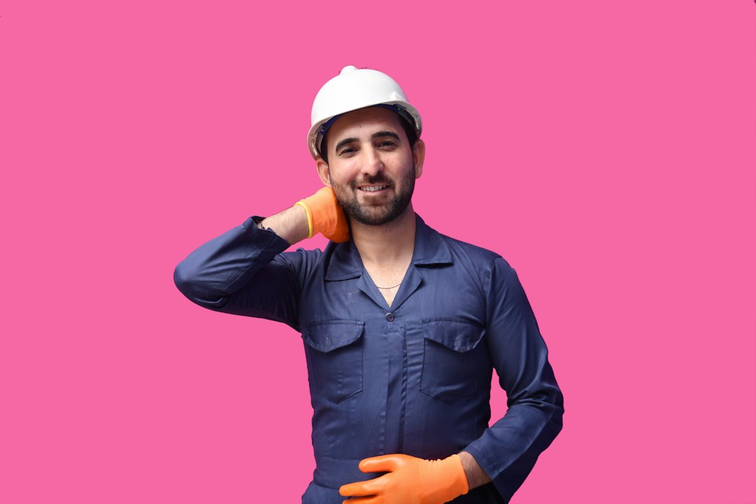 a woman wearing a hard hat home service technician, mobile phone call, local search results
