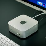 An apple computer with a keyboard and mouse mac remote access security network
