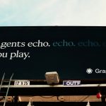 Billboard with "agents echo. echo. echo. you play." brand color palette, muted tones, typography sample, design board