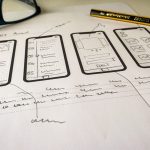 black framed eyeglasses on white printer paper user testing, app prototype, designers, mobile ux research