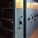 books in shelves in room digital files, secure access, resource library