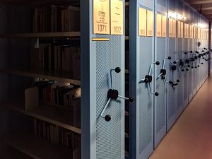 books in shelves in room digital files, secure access, resource library