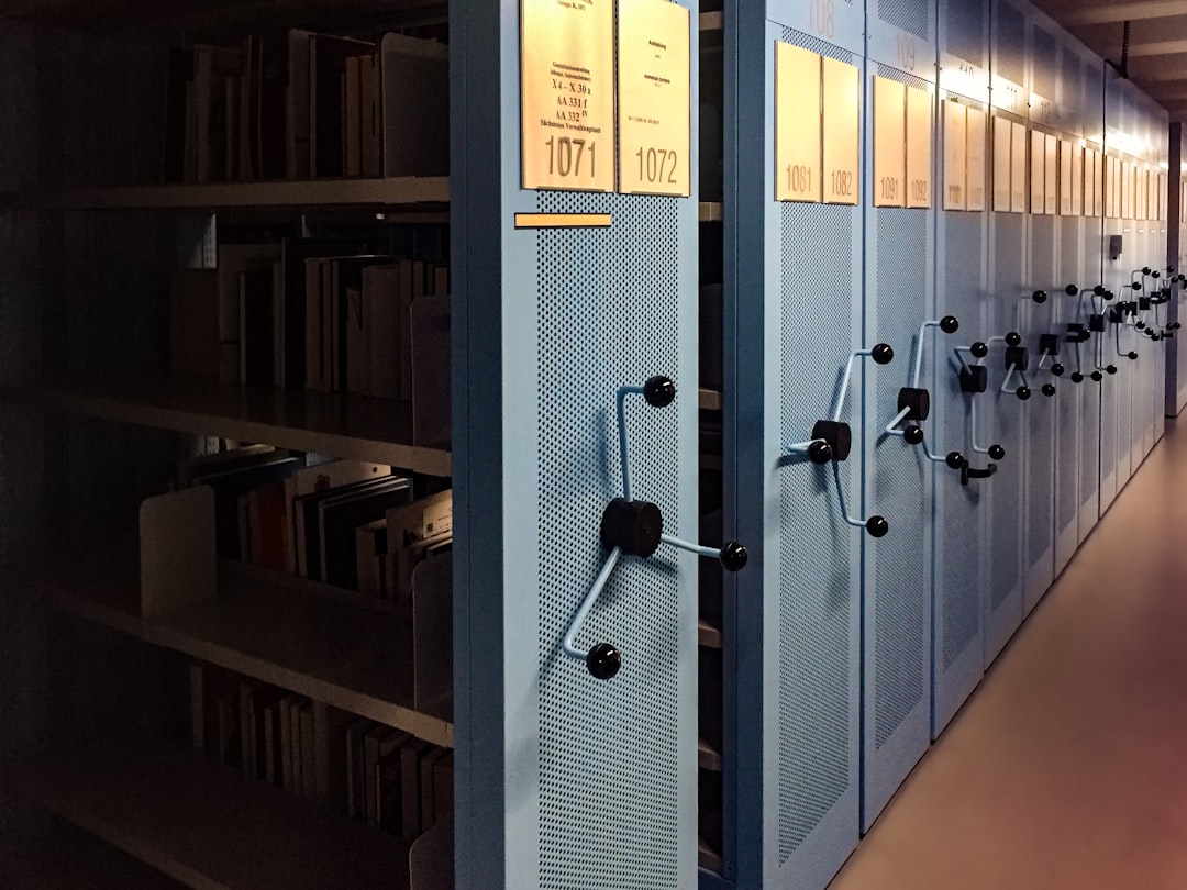 books in shelves in room digital files, secure access, resource library