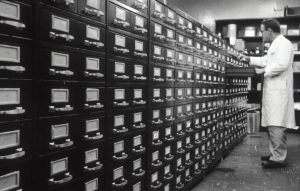 grayscale photo of man digital files, secure access, resource library