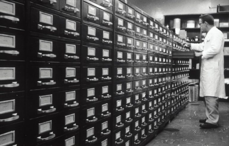 grayscale photo of man digital files, secure access, resource library