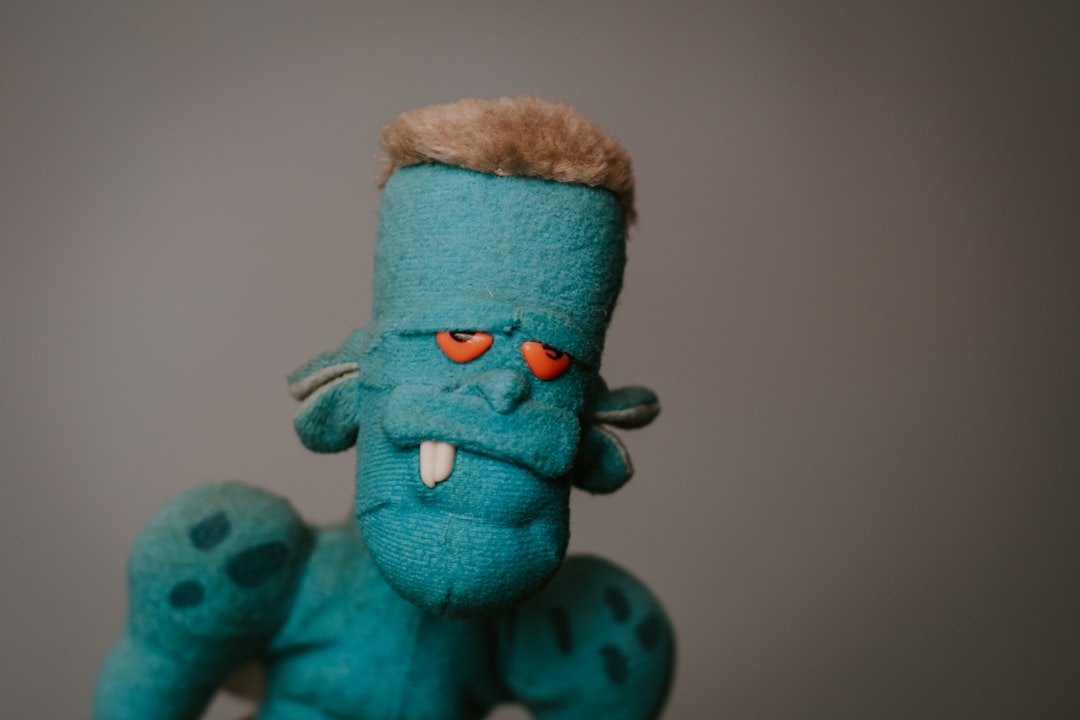 green and brown plush toy puppet design, felt characters, colorful materials