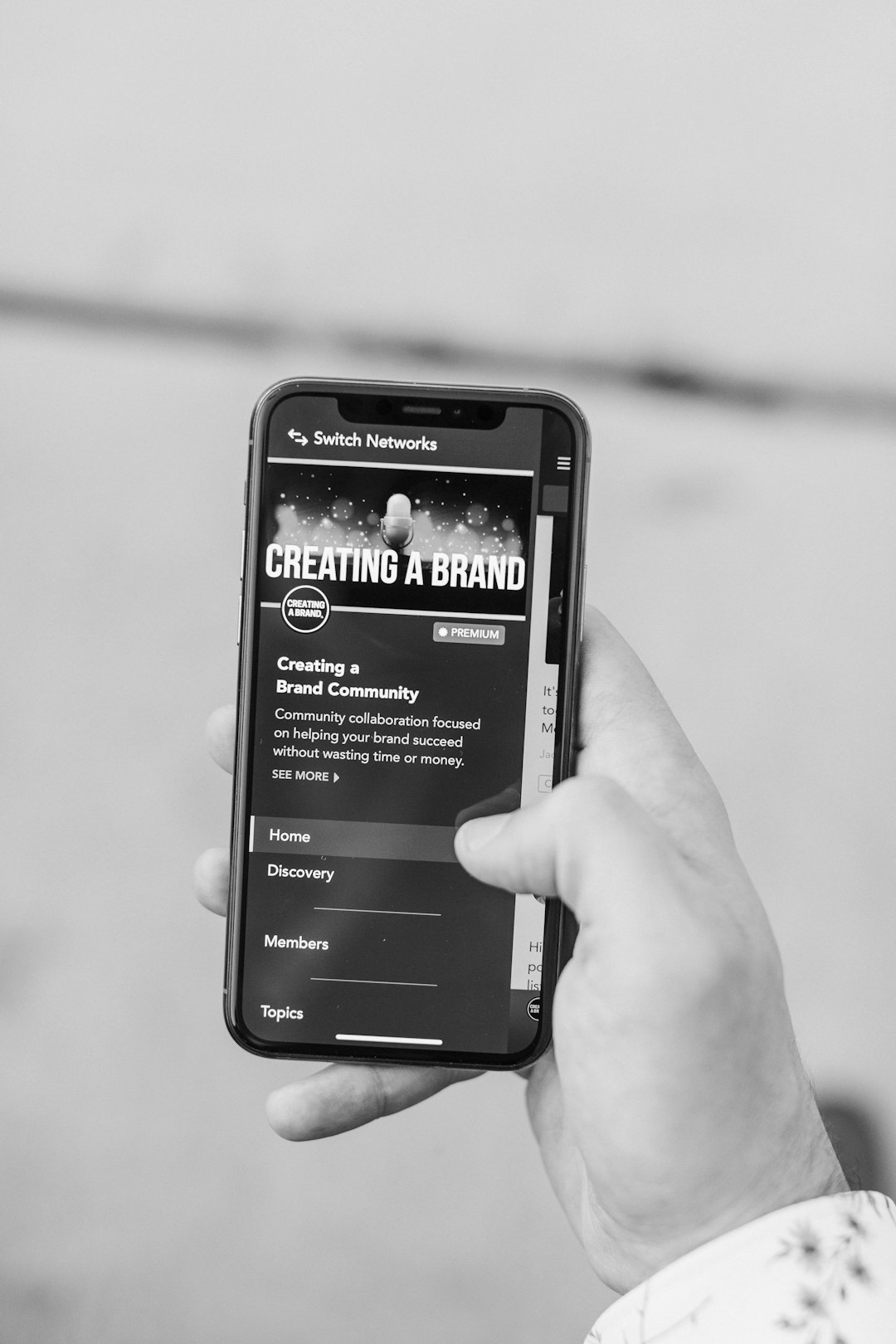 person holding black samsung android smartphone brand strategy, growth scale, product roadmap, team planning