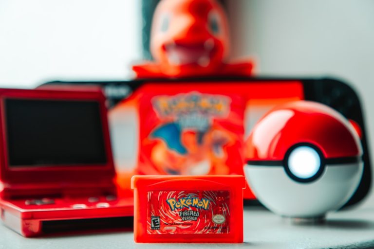 Pokemon game cartridge and accessories on-the-go gaming console pokemon stats, held items, training screen