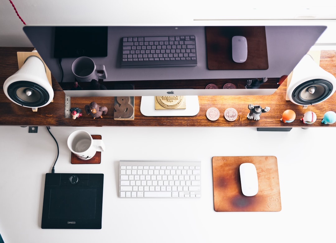 turned of monitor near keyboard and mouse remote desktop mac studio workspace