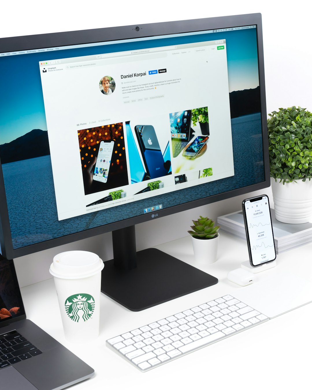 turned on computer monito beside indoor plant ios app design, mobile screens, creative team, startup office