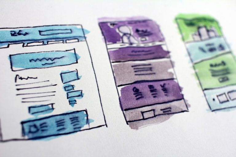 watercolor wireframe sketches of website layouts badge sketches, laptop design, color palette
