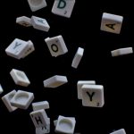 white and black letter t-letter blocks mobile word game, letter tiles, puzzle board