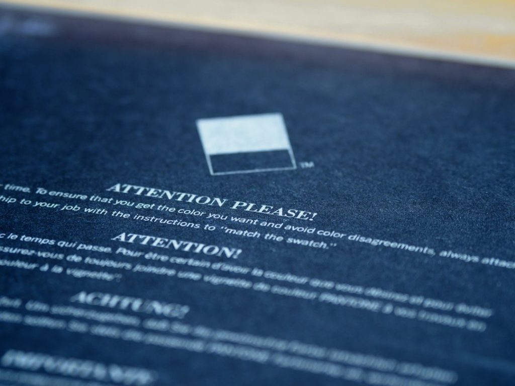 white card on blue textile authorized signatory workflow, contract approval, secure identity