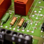 a close up of a circuit board with some electronic components nand gate symbol, logic inputs, digital circuit