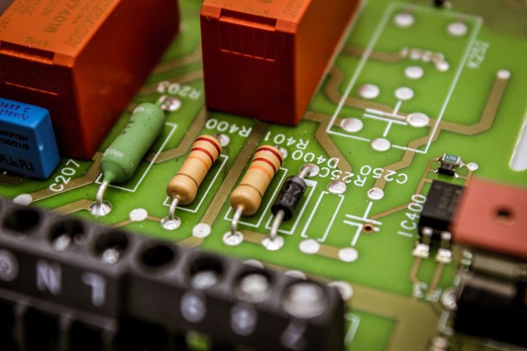 a close up of a circuit board with some electronic components nand gate symbol, logic inputs, digital circuit