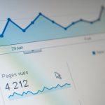a close up of a computer screen with a graph on it wordpress dashboard, seo plugin, faq schema